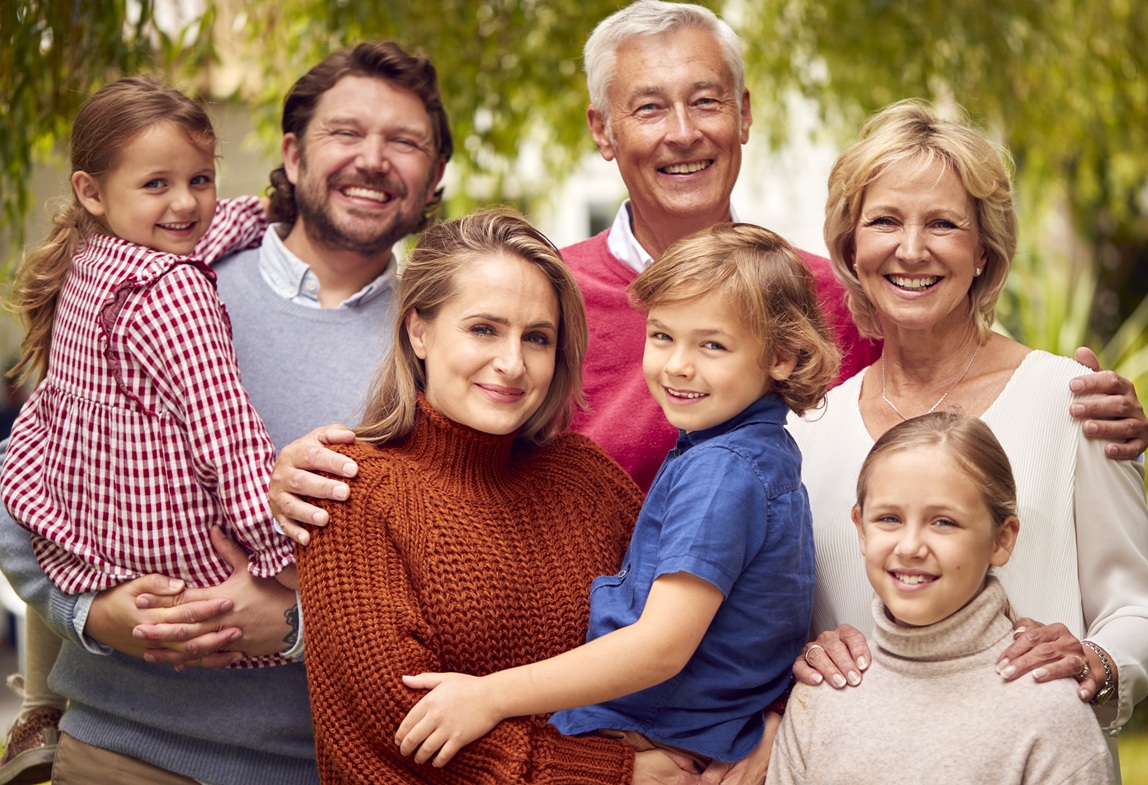 Portrait Of Smiling Multi-Generation Family At Home In Garden Together
